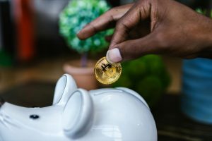 Person building a financial ladder from bottom to top.