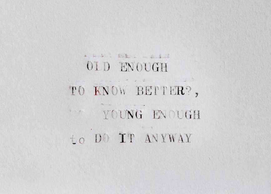 Graphic with text "Enough Is Never Enough" and coins.