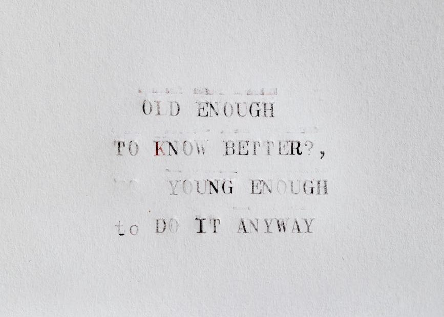 Graphic with text "Enough Is Never Enough" and coins.