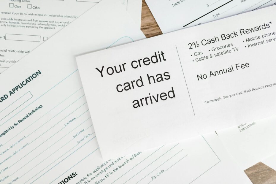 Credit card with rewards icons and a magnifying glass highlighting secrets.