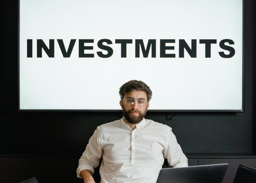 Illustration of a person investing in themselves, represented by a seedling growing from a head.